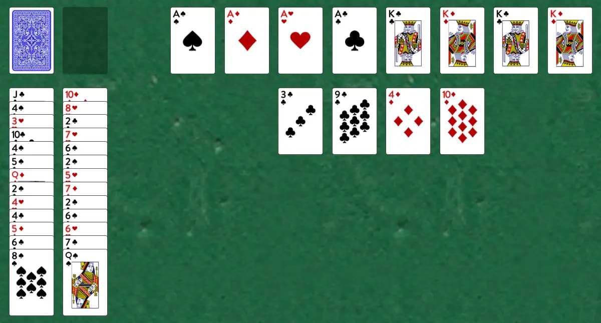 The opening deal of Acey and Kingsley Solitaire, laid out on a green felt table.