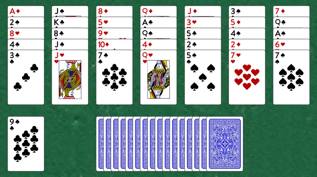 The opening deal of Golf Solitaire, laid out on a green felt table.