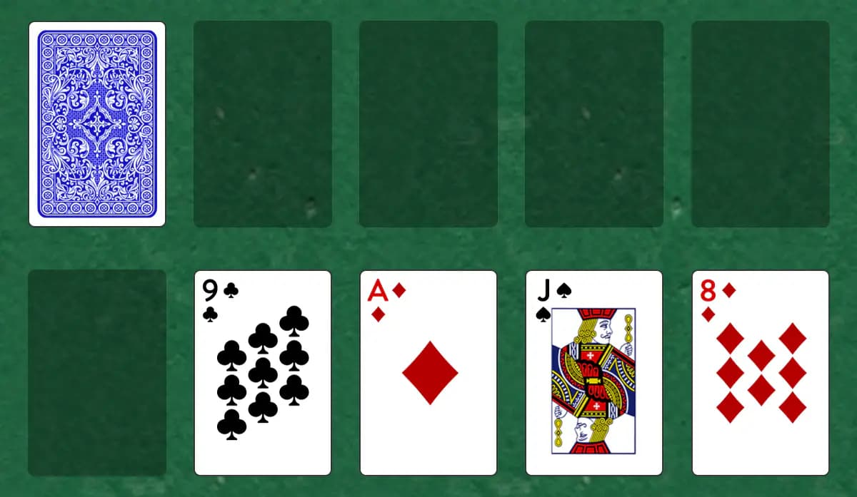The opening deal of Manx Solitaire, laid out on a green felt table.