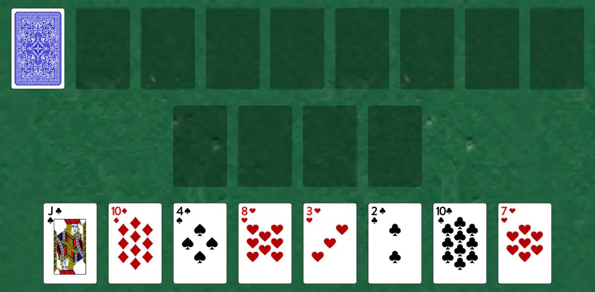 The opening deal of Milligan Cell Solitaire, laid out on a green felt table.