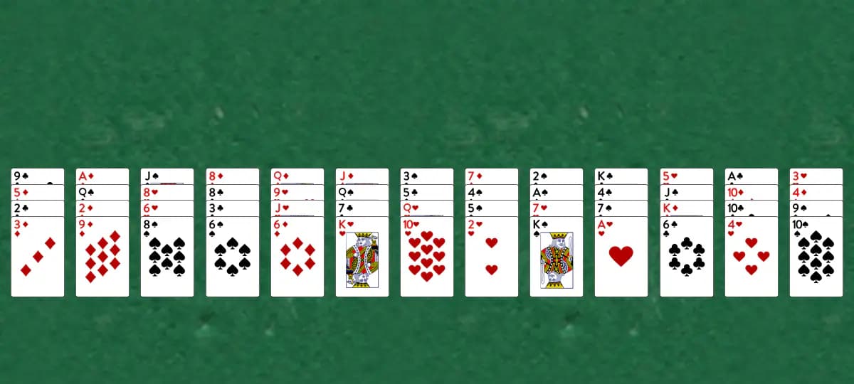 The opening deal of Patient Pairs Solitaire, laid out on a green felt table.