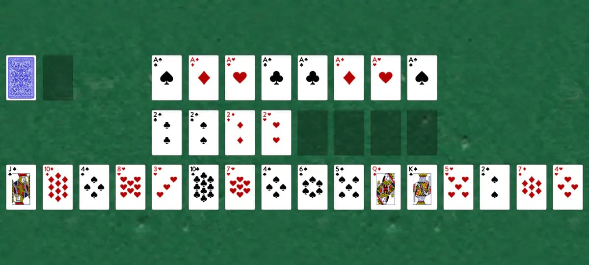 The opening deal of Royal Rendezvous Solitaire, laid out on a green felt table.
