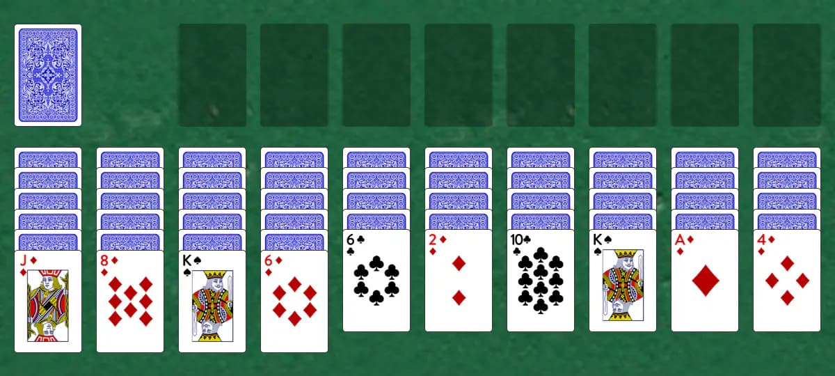 The opening deal of Spider Solitaire, laid out on a green felt table.
