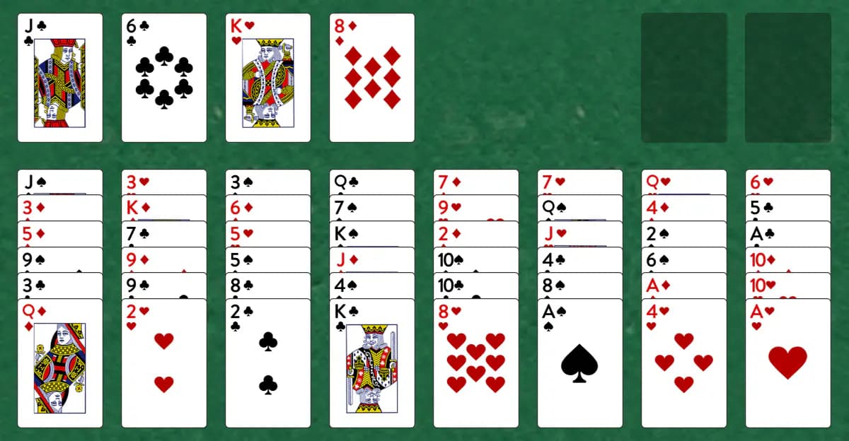 The opening deal of Stalactites Solitaire, laid out on a green felt table.