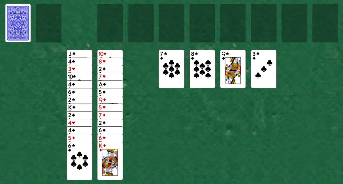 The opening deal of Aces and Kings Solitaire, laid out on a green felt table.
