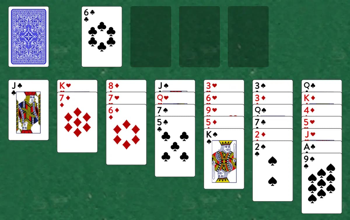 The opening deal of Agnes Sorel Solitaire, laid out on a green felt table.
