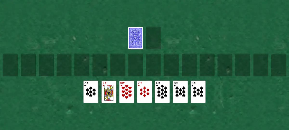 The opening deal of Junction Solitaire, laid out on a green felt table.