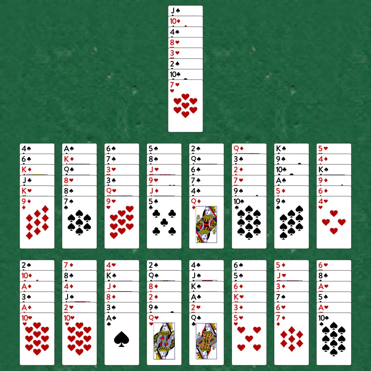 The opening deal of Juvenile Solitaire, laid out on a green felt table.