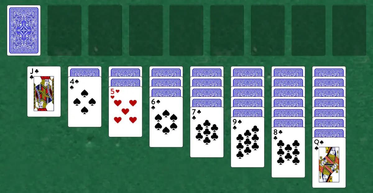 The opening deal of Milligan Yukon Solitaire, laid out on a green felt table.