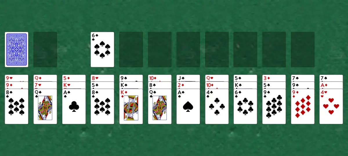 The opening deal of Quadrangle Solitaire, laid out on a green felt table.