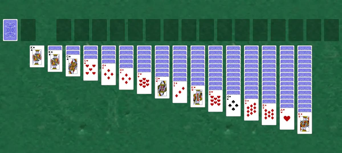The opening deal of Quadruple Trigon Solitaire, laid out on a green felt table.