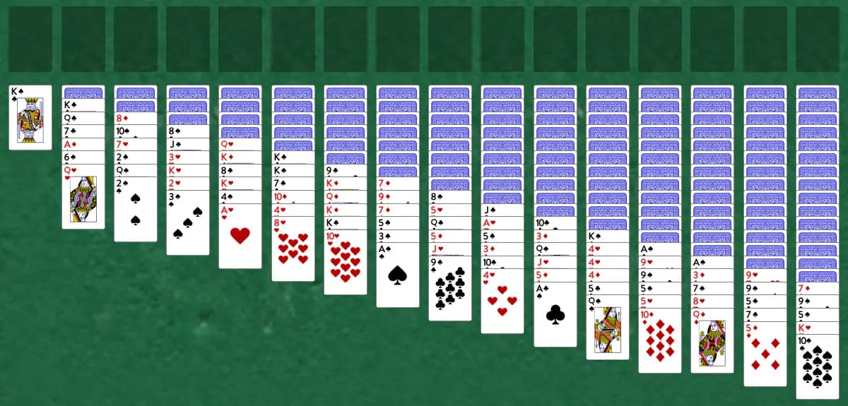 The opening deal of Quadruple Yukon Solitaire, laid out on a green felt table.