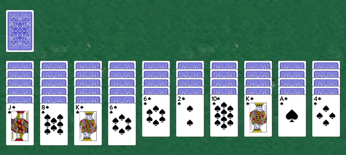 The opening deal of Spider One Suit Solitaire, laid out on a green felt table.