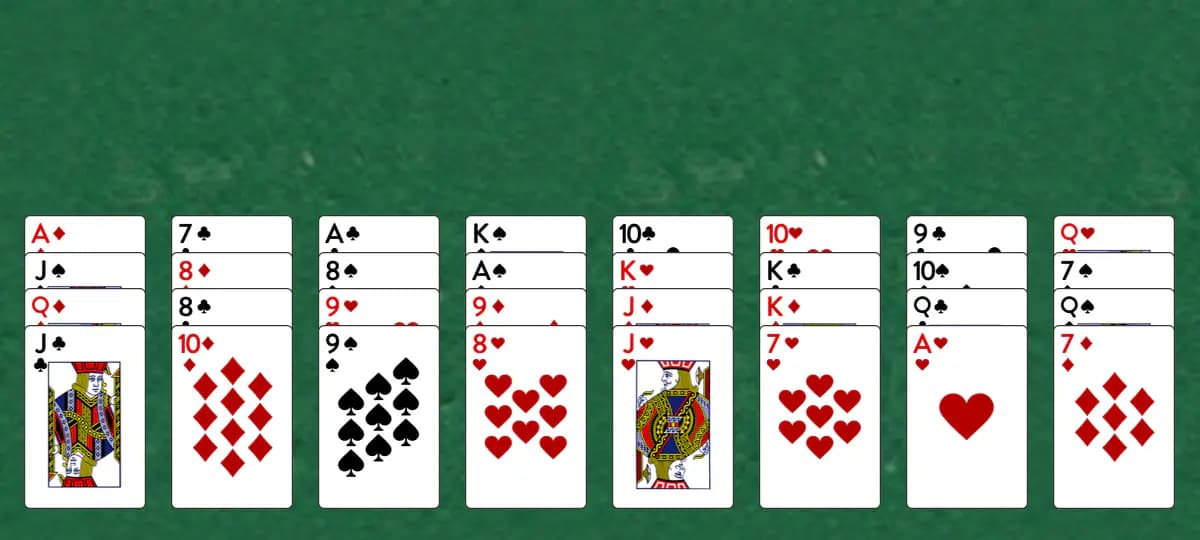The opening deal of The Wish Solitaire, laid out on a green felt table.