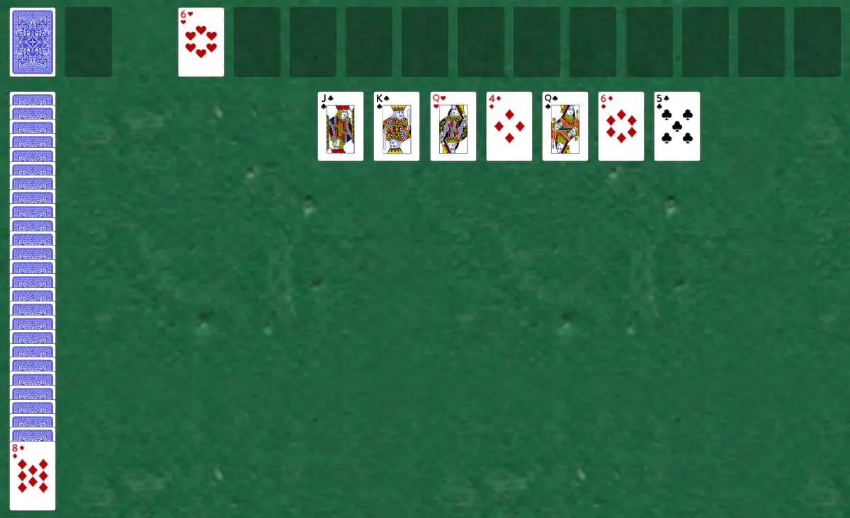 The opening deal of Triple Canfield Solitaire, laid out on a green felt table.