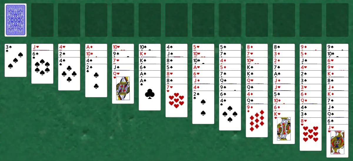 The opening deal of Triple Triangle Solitaire, laid out on a green felt table.