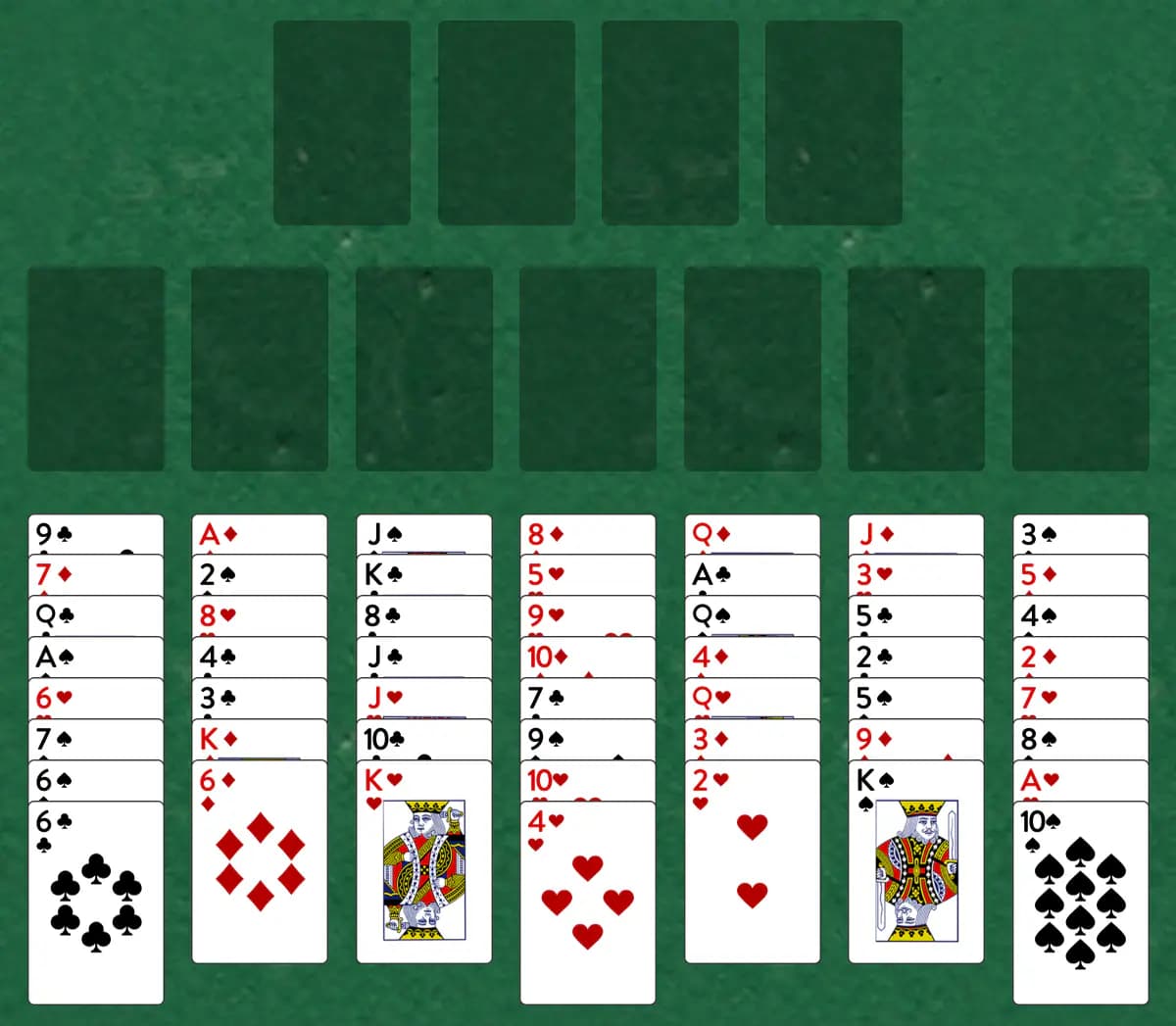 The opening deal of Tuxedo Solitaire, laid out on a green felt table.