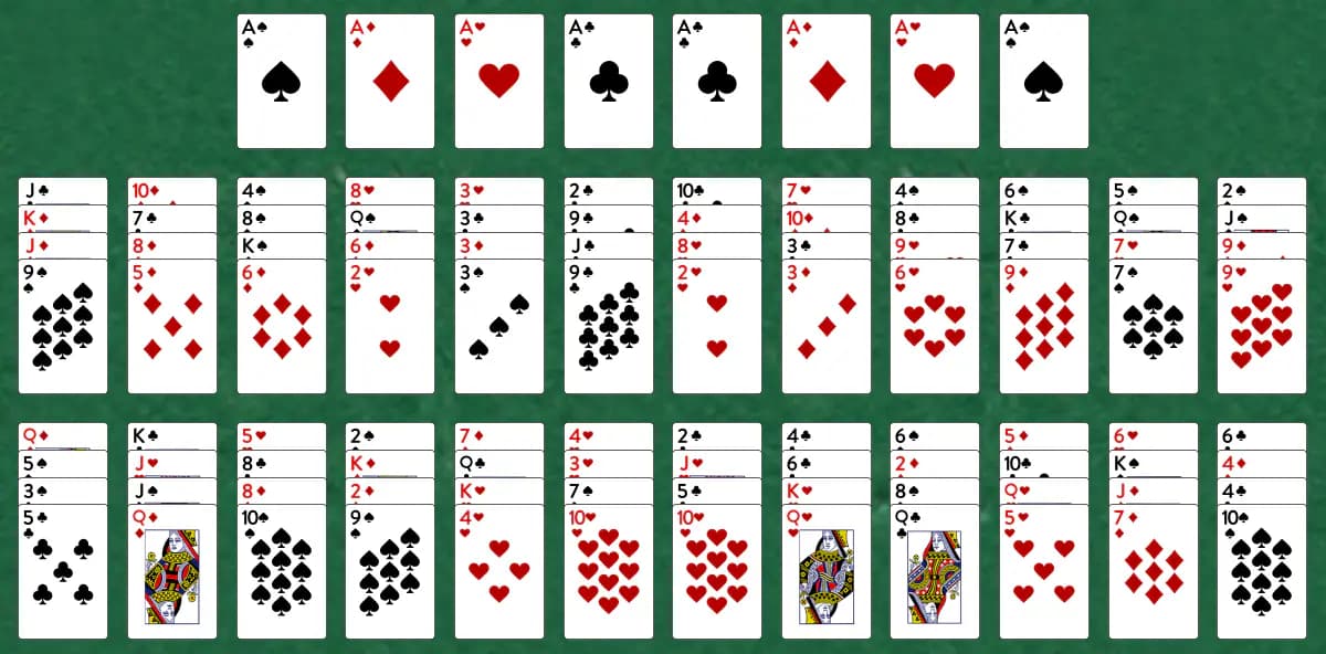 The opening deal of Unusual Solitaire, laid out on a green felt table.