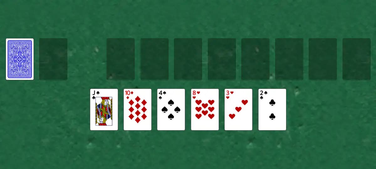 The opening deal of Waterloo Solitaire, laid out on a green felt table.